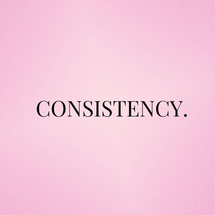 A soft pink gradient card with the single word Consistency set in a serif.